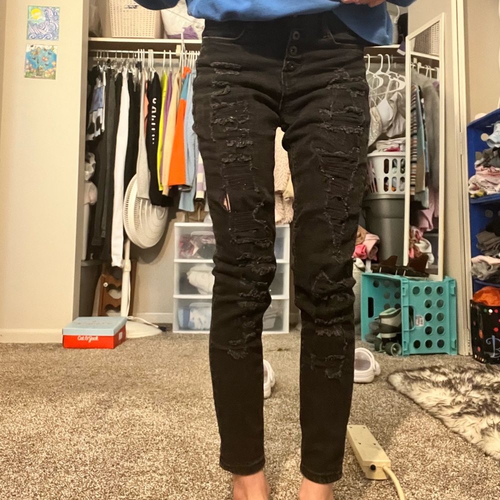 Mid rise relaxed skinny button up denim jeans